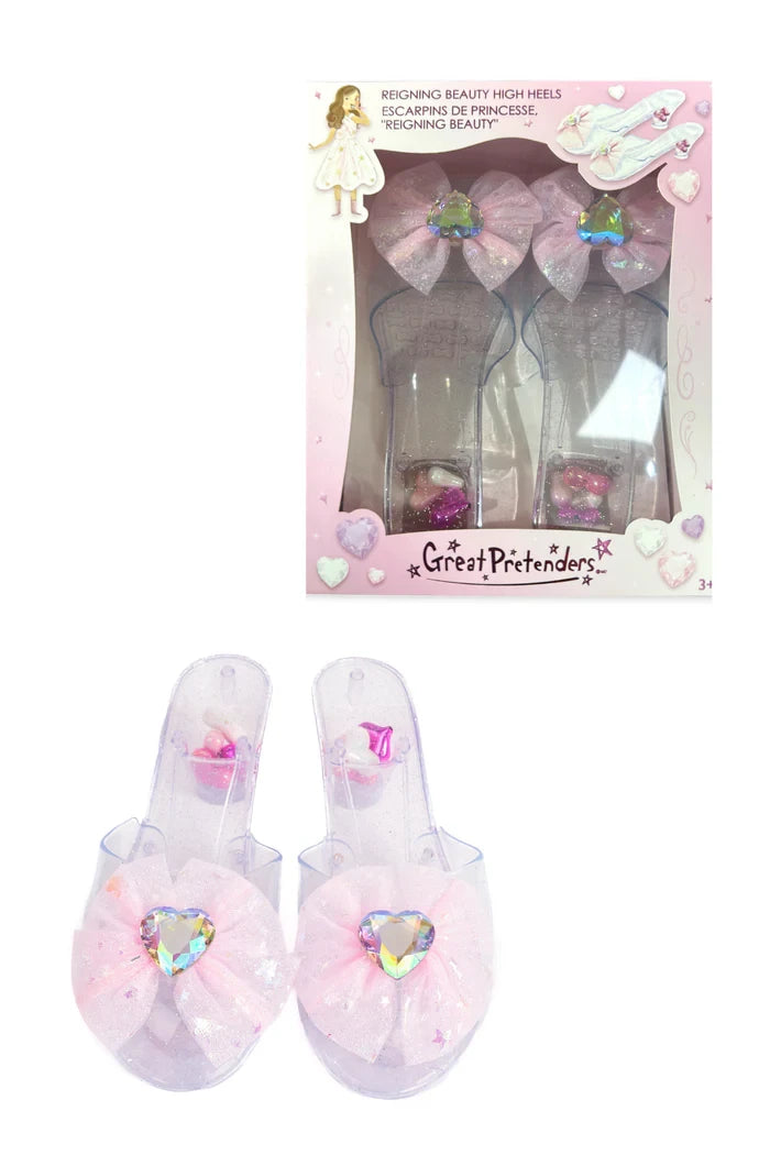 Great Pretenders Reigning Beauty pink clear plastic high heel dress-up shoes with bow and gem detail for children
