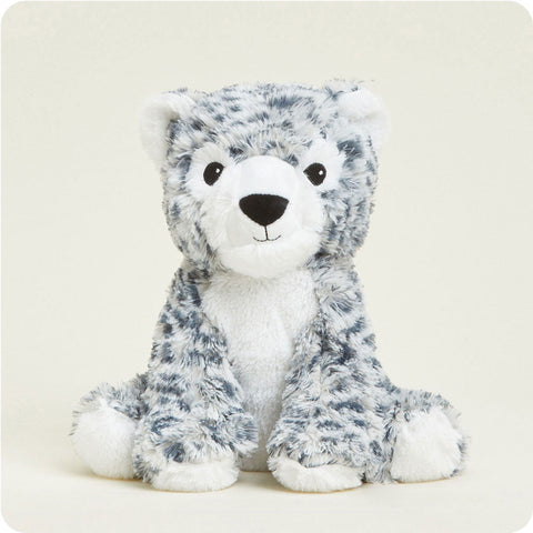 Warmies Snow Leopard stuffed animal with gray spotted plush fur sitting upright on neutral background