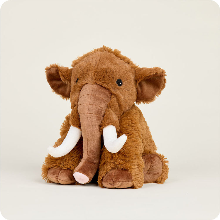 Warmies Wooly Mammoth plush stuffed animal with white tusks, brown fur, sitting upright