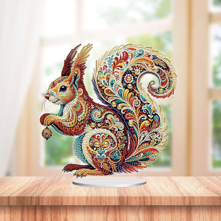 Ornate gemstone squirrel tabletop decoration with colorful paisley diamond painting patterns on display stand