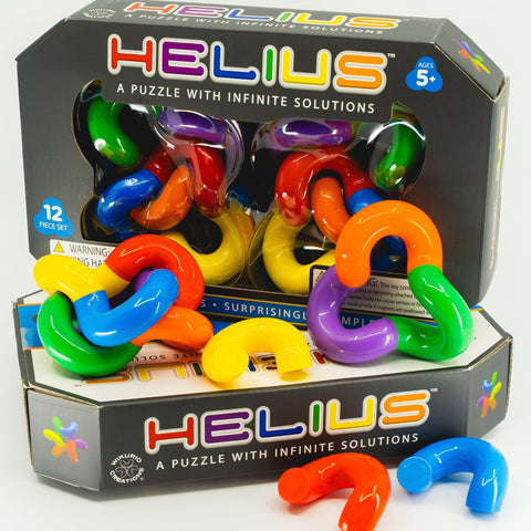 Helius puzzle set with colorful interlocking curved pieces and black packaging box