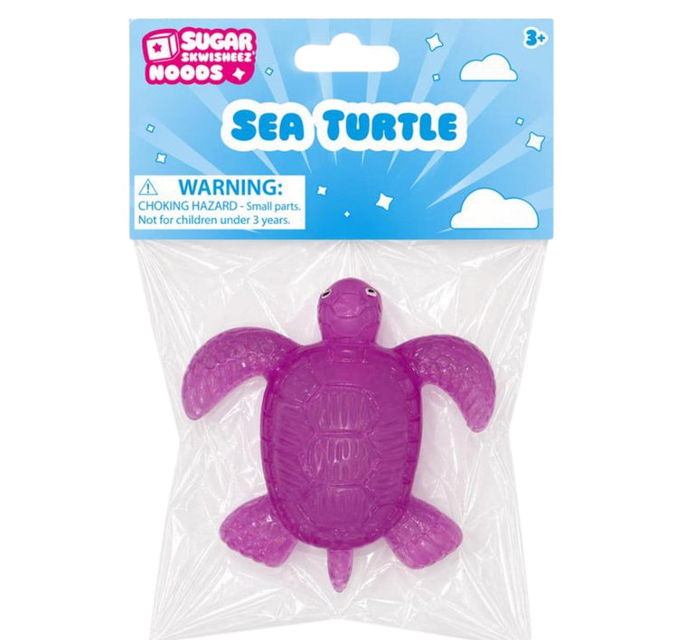 Sugar Skwisheez Noods purple sea turtle squishy toy in clear packaging with blue header card