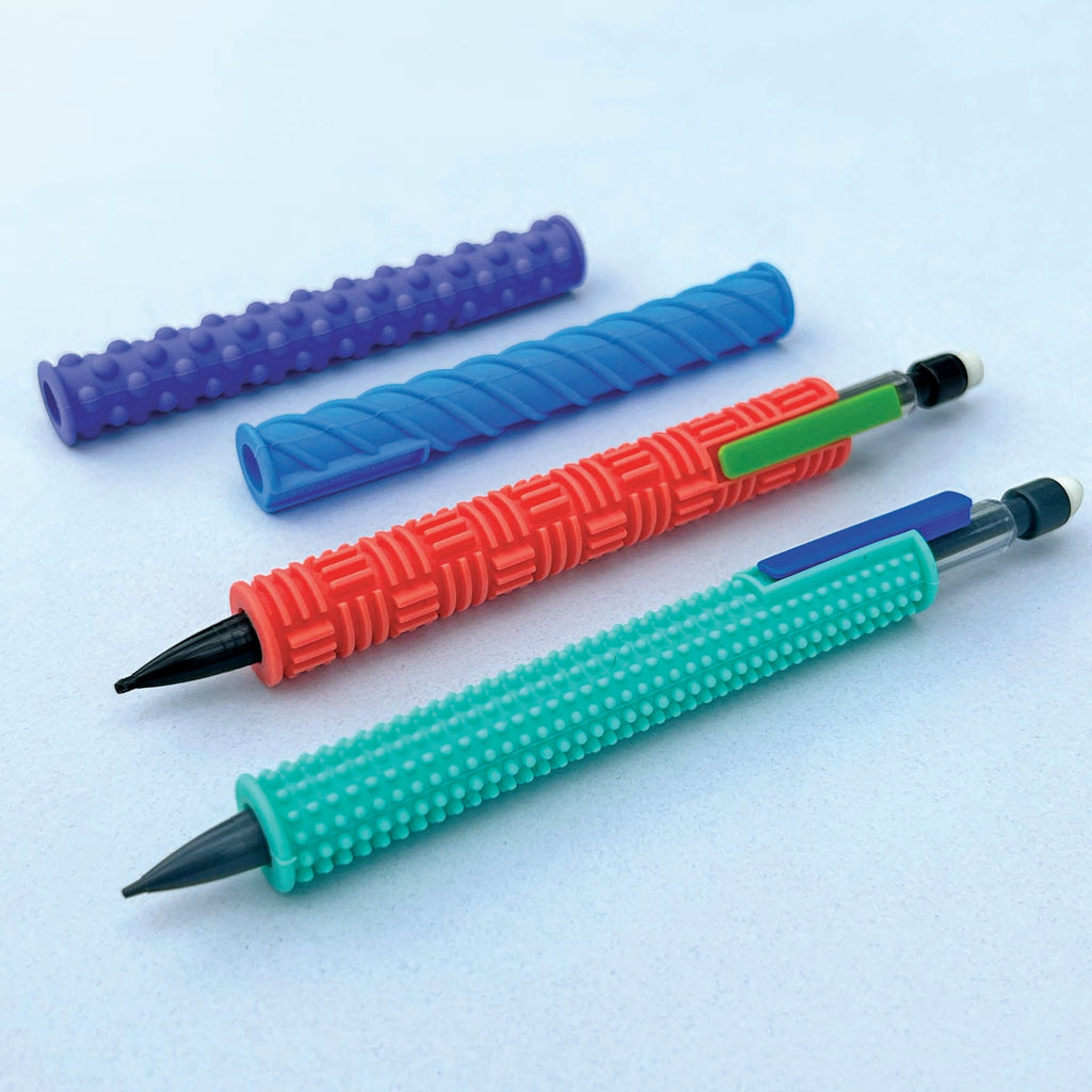 Four textured silicone pencil grip sleeves in teal, red, blue, and purple with two mechanical pencils.