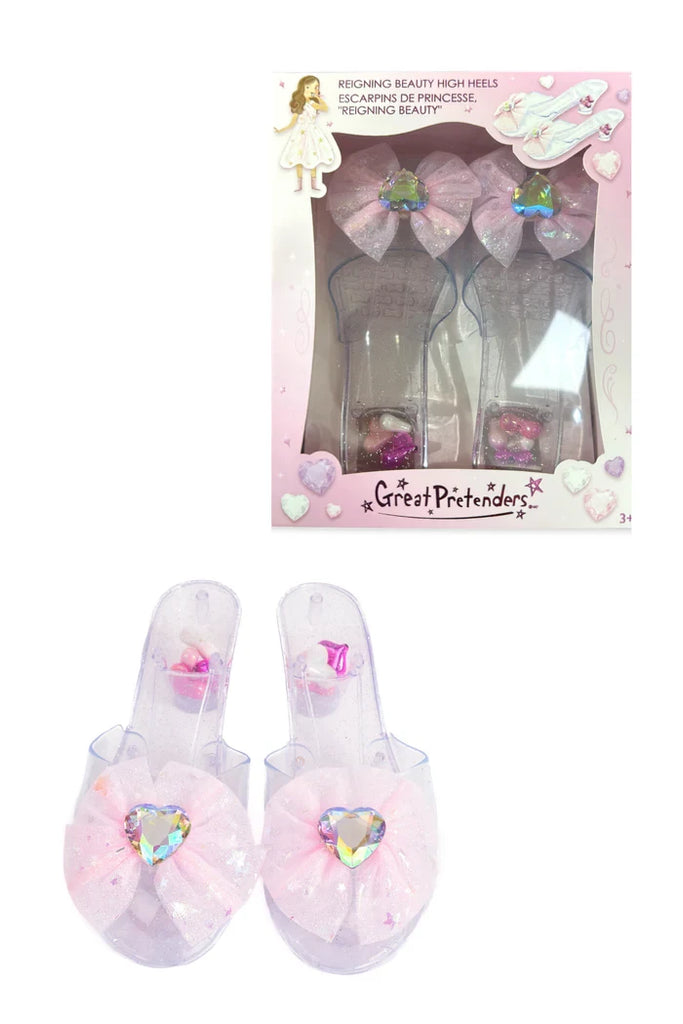 Great Pretenders Reigning Beauty pink clear plastic high heel dress-up shoes with bow and gem detail for children
