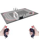 Turbo City small slot car racing track set with two wired hand controllers for two players