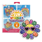 Ooly Sun Sparkles Rainbow Magic Gem Suncatcher Kit showing colorful butterfly, unicorn, rainbow, and flower designs