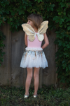 Child wearing gold sequin butterfly wings with silver sequin tutu skirt fairy costume