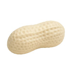 Cream-colored peanut-shaped squishy stress toy with textured dimpled surface on white background