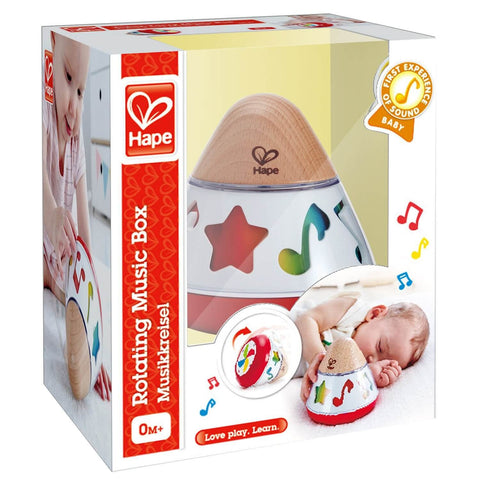 Hape Rotating Music Box in packaging, wooden cone-shaped baby musical toy with colorful star cutouts