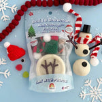 Build a Snowman Mini KidDough Play Pack with white dough, accessories, and assembled snowman example