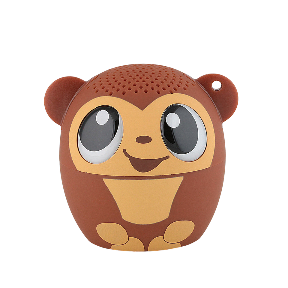 Cute brown monkey-shaped Bluetooth speaker with big eyes and smiling face on white background