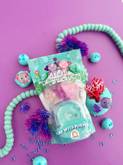 Axolotl Mini Kiddough Play Pack displayed on purple background with teal beads and coral accessories