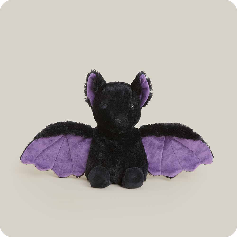 Warmies black plush bat stuffed animal with spread purple wings and ear lining