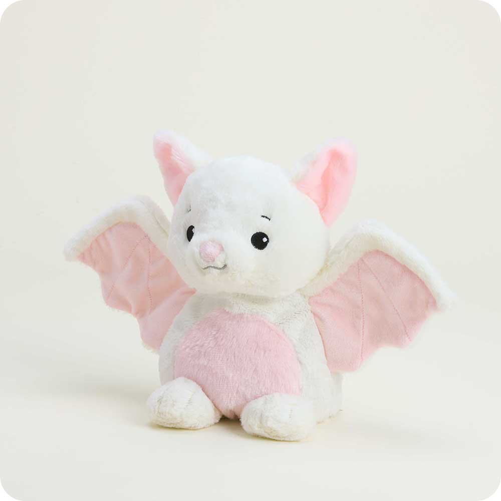 Warmies white bat stuffed animal plush with pink wings and ears on neutral background