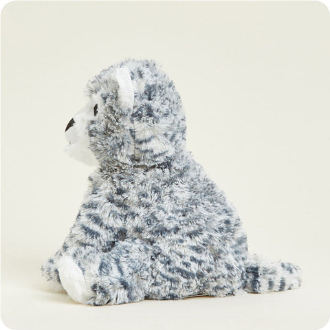 Warmies Snow Leopard stuffed animal with gray spotted plush fur sitting upright on neutral background