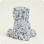 Warmies Snow Leopard stuffed animal shown from behind, gray spotted plush toy seated upright