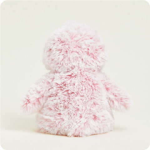 Pink and white fluffy penguin stuffed animal with pink beak and feet by Warmies