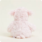 Rear view of pink fluffy Warmies pig stuffed animal with shaggy texture and floppy ears