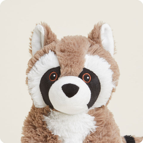 Warmies raccoon stuffed animal with striped tail and embroidered eyes, seated upright