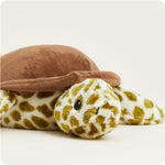 Warmies plush turtle stuffed animal with brown shell and spotted olive green body