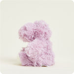 Lavender purple fluffy Warmies Junior Hippo stuffed animal shown from side angle