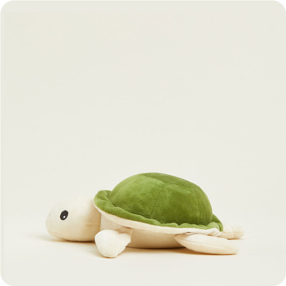 Warmies Junior Turtle plush stuffed animal with green shell and cream body on white background