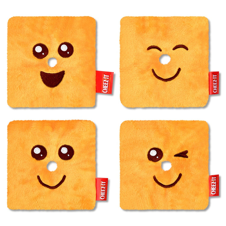 Set of four Cheez-It plush toys with different embroidered facial expressions on white background