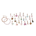Cozy Christmas bracelet advent calendar with 24 holiday charms and two bracelets on white background