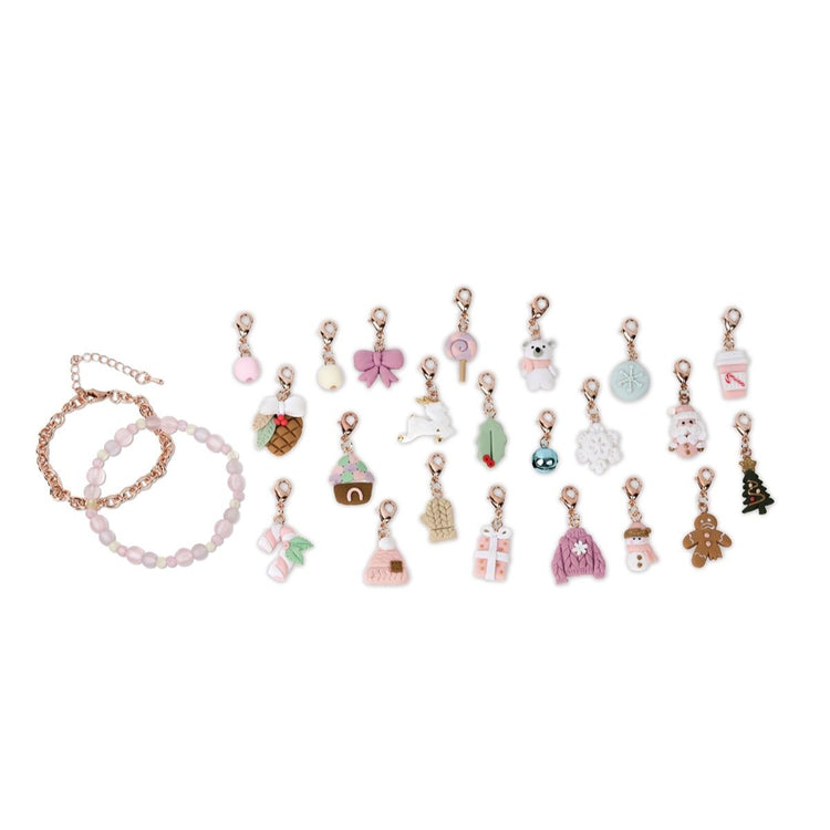 Cozy Christmas bracelet advent calendar with 24 holiday charms and two bracelets on white background