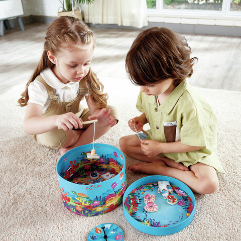 Save The Seas magnetic fishing game with ocean-themed wooden pieces, spinner, and fishing rods