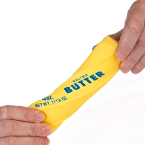 Yellow foam stress toy shaped like a stick of salted butter, 4oz squeezable novelty item