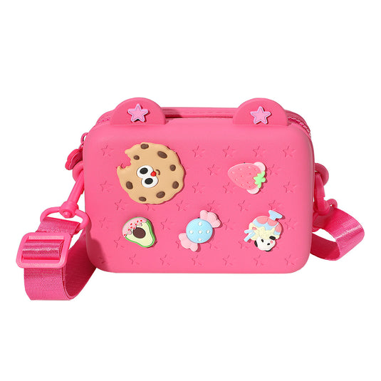 Hot pink silicone crossbody bag with cute food charm decorations and adjustable strap
