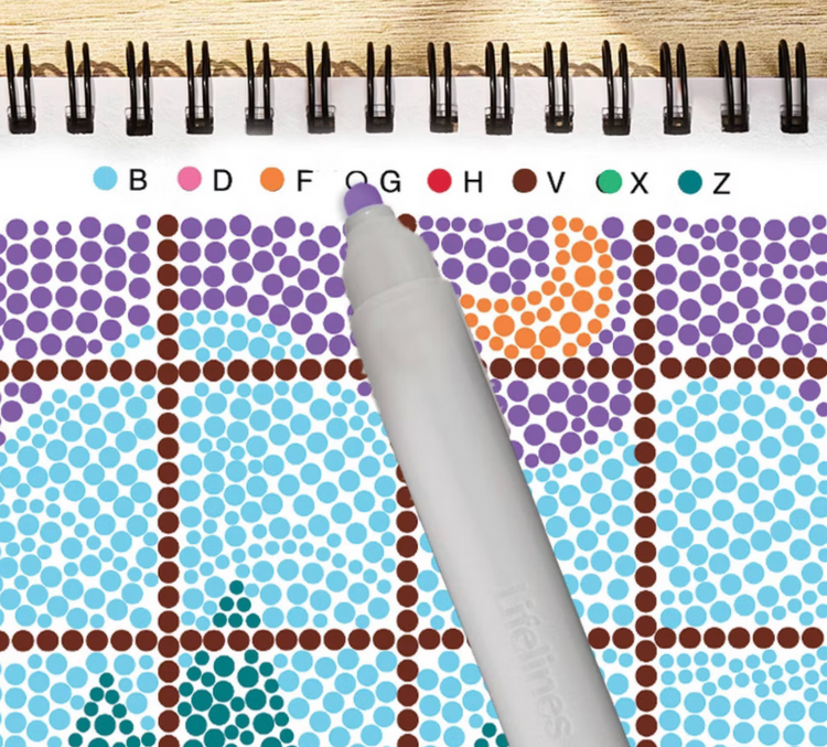 Lifelines FlowArt dot-by-letter coloring book open to snowed-in pattern with purple marker