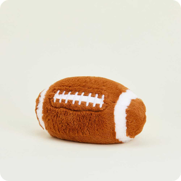 Warmies plush football stuffed animal in brown with white laces and stripe details
