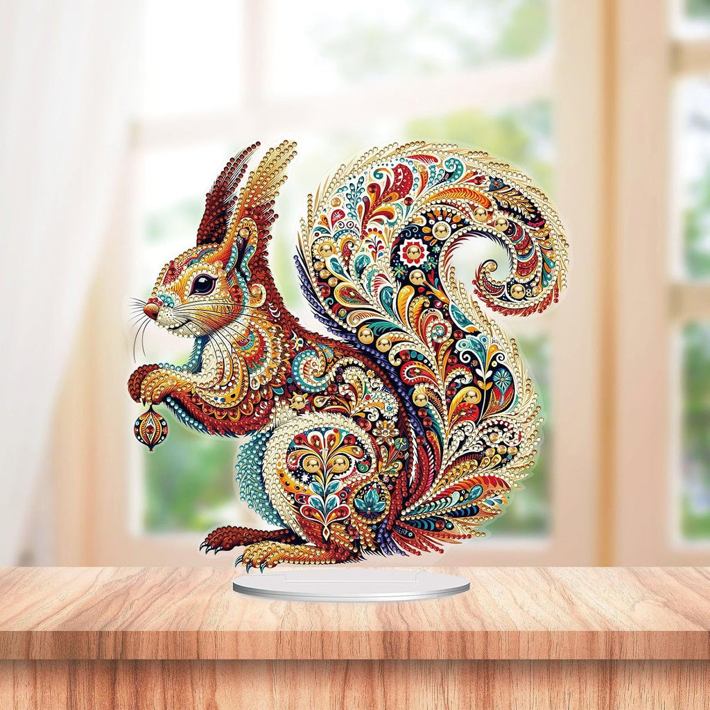 Ornate gemstone squirrel tabletop decoration with colorful paisley diamond painting patterns on display stand