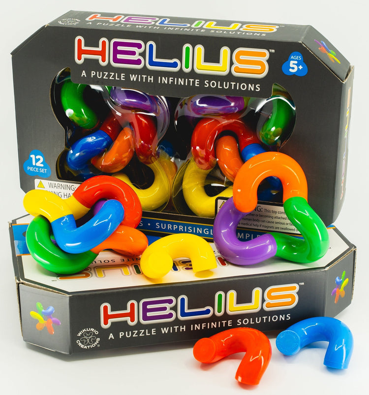 Helius puzzle set with colorful interlocking curved pieces and black packaging box