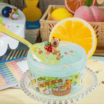 Kawaii Slime Capybara Fruit Spa slime in clear jar with cute bear figurine holding strawberry