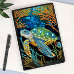 Diamond painting notebook with colorful beaded sea turtle design on black cover
