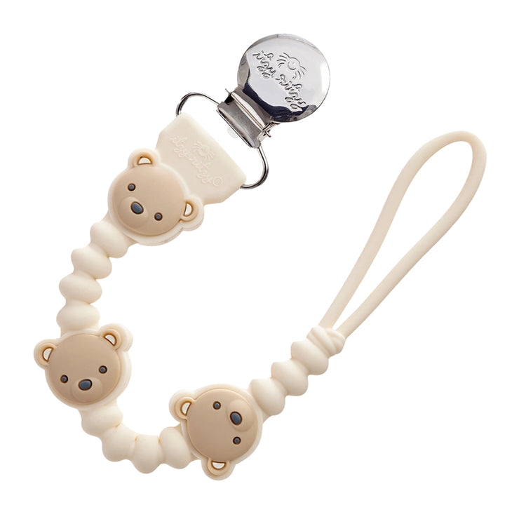 Itzy Ritzy Sweetie Strap Plus pacifier clip with three silicone bear face beads in cream and tan
