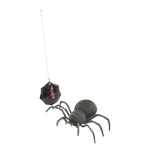 Black RC remote control spooky spider toy with web pendant hanging from silk thread