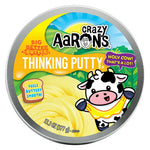 Crazy Aaron's Big Better Butter Thinking Putty large tin with cartoon cow illustration
