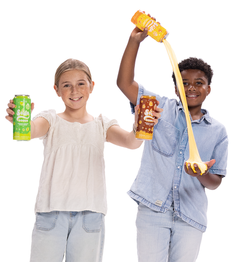 Two children smiling and playing with Soda Dough slime, holding green and brown branded cans