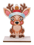 Crystal diamond art reindeer ornament with Santa hat on wooden display stand