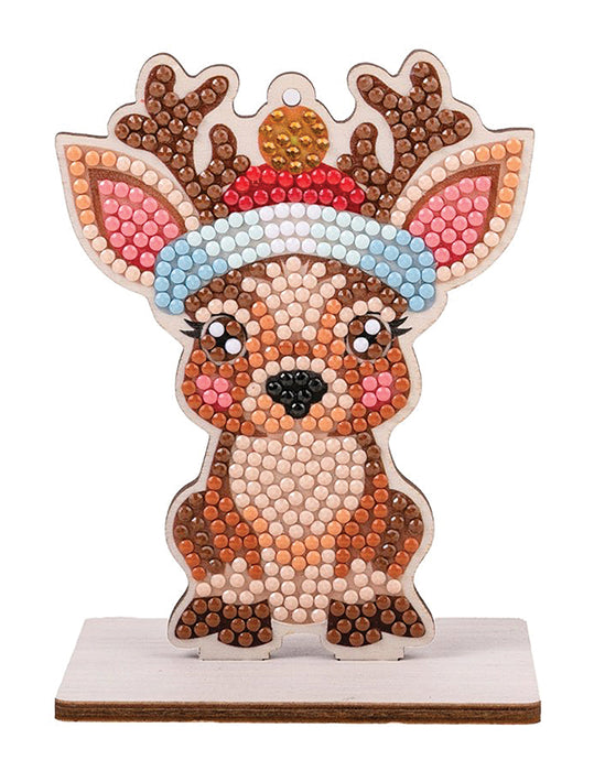 Crystal diamond art reindeer ornament with Santa hat on wooden display stand