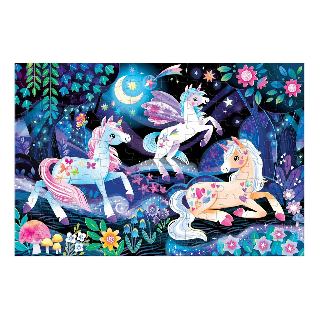 100-piece glow-in-the-dark puzzle featuring three magical unicorns in an enchanted night forest.