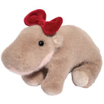 Tan plush hippo stuffed animal wearing a red velvet bow on its head