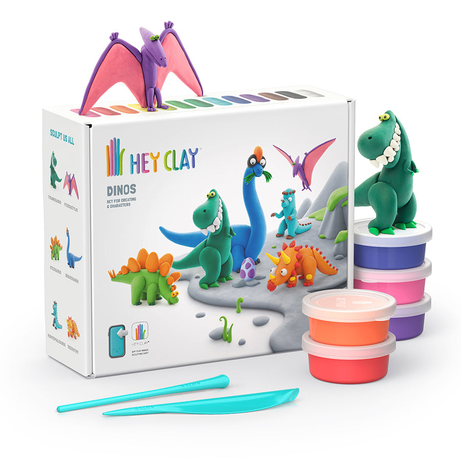 Hey Clay Dinos set with clay containers, sculpting tools, and dinosaur figurines on white background
