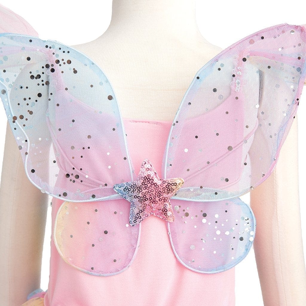 Close-up of rainbow fairy wings with silver glitter and sequin star center on pink dress.