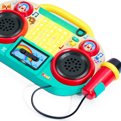 Hape Pixelz Sing-Along Pixel Boombox toy with microphone in colorful packaging for ages 2-6