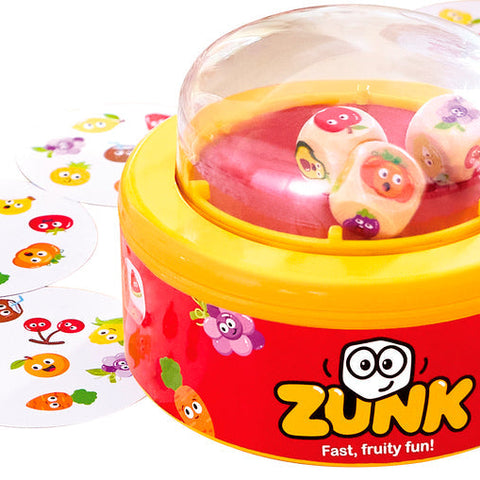 Zunk pattern matching game with dome dice shaker, fruit-themed cards, and colorful fruity characters